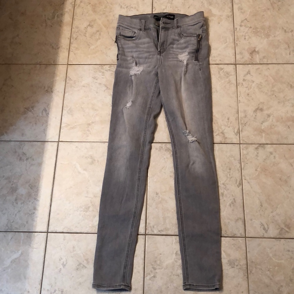 Grey lightly ripped jeans